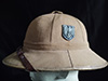 Army tropical sun helmet with tan cotton drill cover over cork